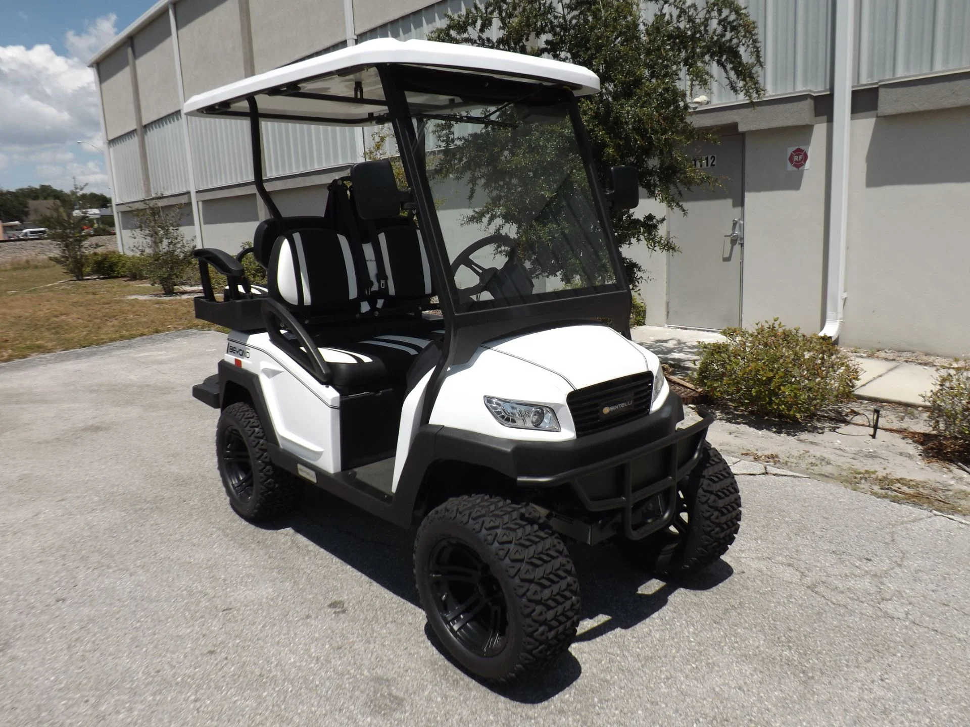 White 2022 Bintelli BEYOND 4P Lifted Golf Cart